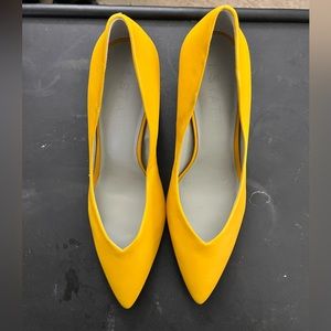 Yellow block heel pumps